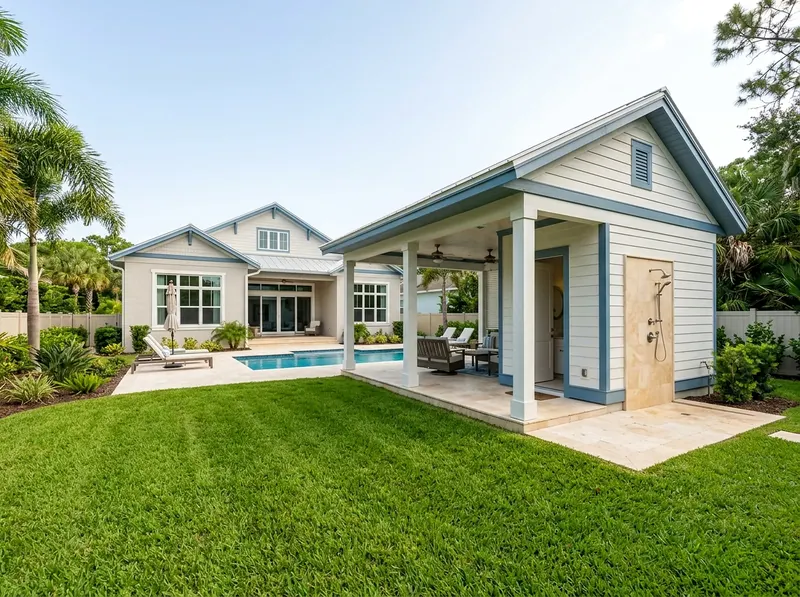 Smaller yard Limestone With a bath Coastal pool house